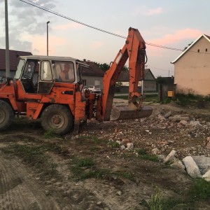 Utovarivač - kombinirka
