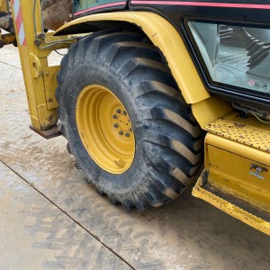 Kombinirka Caterpillar 428 D, 2004 Godina