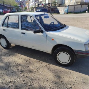 Prodajem auto - oldtajmer - Peugeot 205 1.1 look