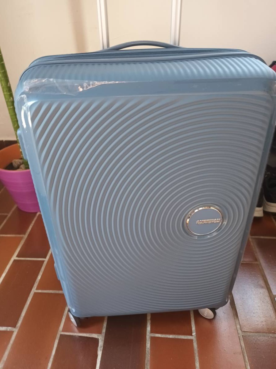 Novi kufer American Tourister Soundbox 7675