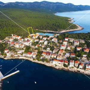 Građevinsko zemljište 437 m² s idejnim projektom i građevinskom dozvolom – uvala