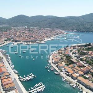 Građevinsko zemljište, neometan pogled na more i uvalu, mir i privatnost, 595 m2