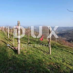 ISTRA, MOTOVUN, KAŠĆERGA - Građevinsko zemljište s građevinskom dozvolom, panoramski pogled!