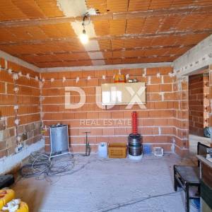 ISTRA, VIŠNJAN - Stan s garažom i pogledom na more u roh bau fazi