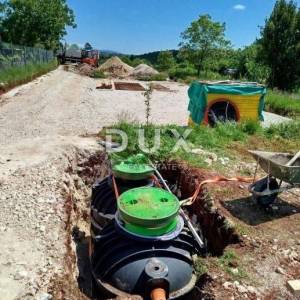 ISTRA, ŽMINJ - Zemljište s dozvolom i započetom gradnjom