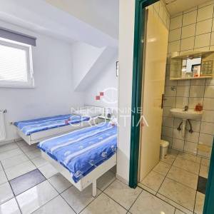 Kuća sa uhodanim poslovnim prostorom!