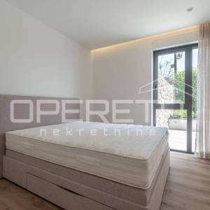 Luksuzan stan u prizemlju moderne novogradnje – Opatija, centar