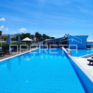 Luksuzni stan u 4* resortu, 2. red do mora, bazen 