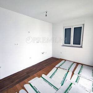 Malinska, prodaja apartmana na drugom katu s pogledom na more i parkingom!