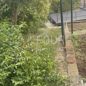 Matulji - centar, zemljište 1.118m2 s dva objekta