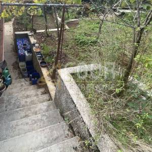 Matulji - centar, zemljište 1.118m2 s dva objekta