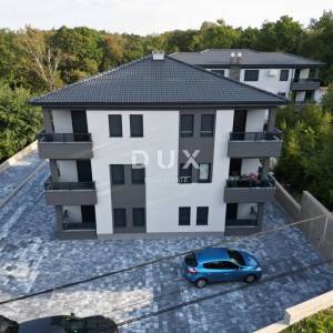 MATULJI, JUŠIĆI, JURDANI- stan prizemlje 62,34 m2 u novogradnji DB+2S s okućnicom
