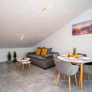 Medulin. Mukalba. Moderan apartman sa velikom terasom i pogledom na more.