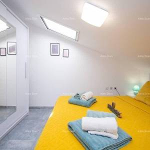 Medulin. Mukalba. Moderan apartman sa velikom terasom i pogledom na more.