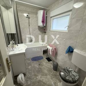 NOVI VINODOLSKI, BRIBIR - Samostojeća kuća, 2 apartmana, garaža, uređeno!