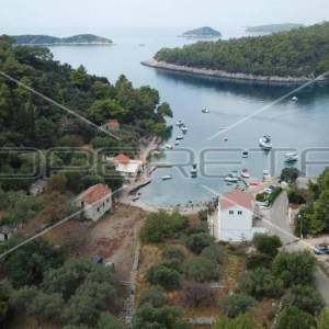 Novogradnja, kuća sa 2 stana i bazenom na krovu, Gršćica, Korčula