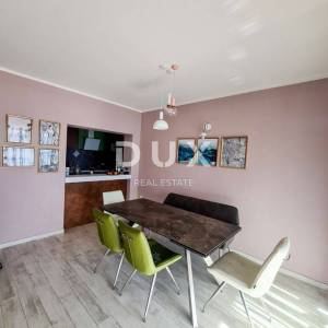 OPATIJA, CENTAR - atraktivan stan s pogledom na more, okućnicom i privatnim ulazom