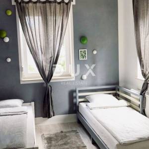 OPATIJA, CENTAR - atraktivan stan s pogledom na more, okućnicom i privatnim ulazom