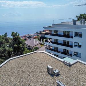 OPATIJA, CENTAR - luksuzna stambeno-poslovna zgrada sa 7 stanova, garažom i bazenom u centru Opatije