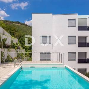 OPATIJA, CENTAR - odličan stan u novogradnji s pogledom na more, zajednički bazen, garaža 