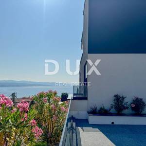 OPATIJA, CENTAR - stan 132m2 u novogradnji s vrtom, bazenom, garažom, pogled na more, centar Opatije