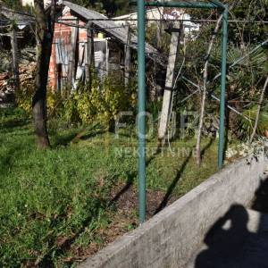Opatija, kuća s 4 stana, garažom i okućnicom, 500m od mora!