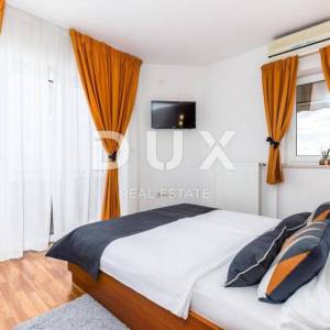 OPATIJA, LOVRAN- apartmanska zgrada od 700m2 s bazenom + 6000m2 zemljišta s građevnom dozvolom za wellness resort s 28 soba...