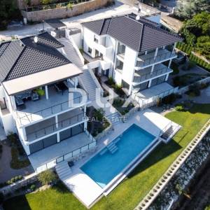 OPATIJA, LOVRAN, LIGANJ - Stan u vili s bazenom 120m2+terasa 27m2s panoramskim pogledom na more + okoliš 105m2