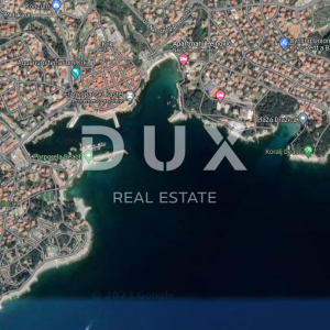 OTOK KRK, GRAD KRK, CENTAR - građevinsko zemljište 1.325 m2 s pogledom na more za stambenu zgradu / stanove / apartmane / obite...