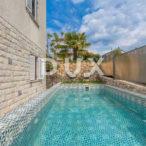 OTOK KRK, MALINSKA - apartmanska kuća s dva bazena i pogledom na more