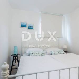 OTOK KRK, MALINSKA - apartmanska kuća s dva bazena i pogledom na more