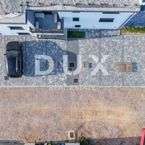 OTOK KRK, MALINSKA - Moderan stambeni prostor 125 m2 + okućnica i 2 parkinga u vlasništvu!