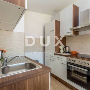 OTOK KRK, NJIVICE - Kuća s apartmanima i poslovnim prostorom