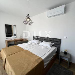 OTOK PAG, NOVALJA - luksuzni apartman u kućicama u nizu NOVOGRADNJA