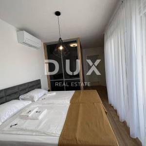 OTOK PAG, NOVALJA - luksuzni apartman u kućicama u nizu NOVOGRADNJA