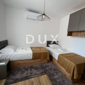 OTOK PAG, NOVALJA - luksuzni apartman u kućicama u nizu NOVOGRADNJA