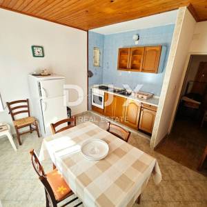 OTOK RAB - Apartmanska kuća 1. red do mora!