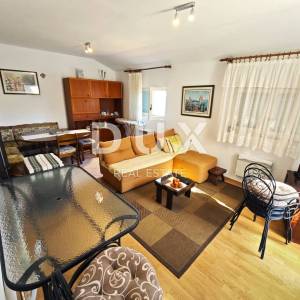 OTOK RAB - Apartmanska kuća 1. red do mora!