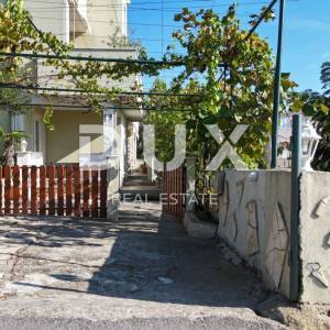 OTOK RAB, BANJOL - Odlična kuća s okućnicom i pogledom na more