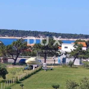 OTOK RAB, BANJOL- zemljište 200 metara od mora za izgradnju kuće