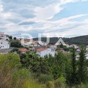 OTOK RAB, KAMPOR - građevinsko zemljište 2850 m2 pored mora