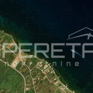Pašman - građevinsko zemljište 1157 m², prvi red do mora
