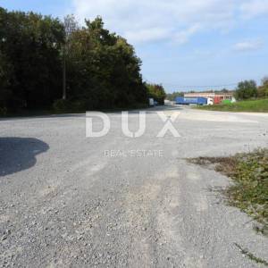 PERMANI, JURDANI-građevinsko zemljište 2000m2 s građ. dozvolom za halu od 600m2 (namjena: trgovačka, zanatska, industrijska)...