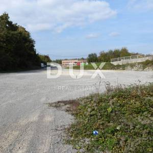 PERMANI, JURDANI-građevinsko zemljište 2000m2 s građ. dozvolom za halu od 600m2 (namjena: trgovačka, zanatska, industrijska)...