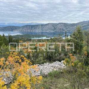 Poljoprivredno zemljište s potencijalom – 9435 m² u srcu prirode