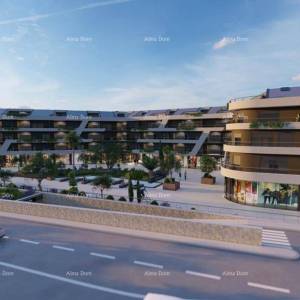 Poreč, stambeno poslovni objekt  sa apartmanima i podzemnim garažama.S74