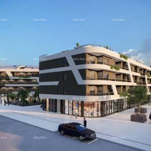Poreč, stambeno poslovni objekt  sa apartmanima i podzemnim garažama.S74