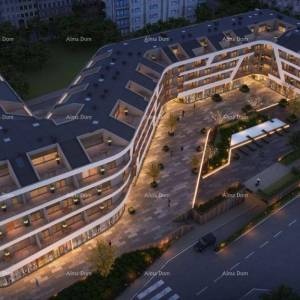 Poreč, stambeno poslovni objekt  sa apartmanima i podzemnim garažama.S74