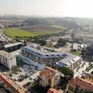 Poreč, stambeno poslovni objekt  sa apartmanima i podzemnim garažama