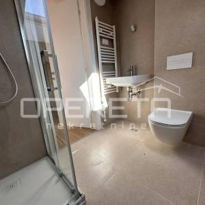 Stan 84,94 m2 s vrtom i 2 parkinga, novogradnja, Cavtat